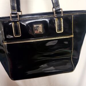 Dooney & Bourke Glossy Black Bag with Gold Accents